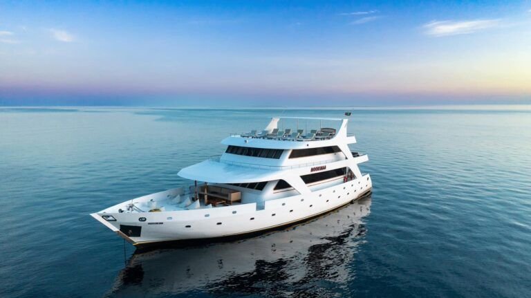Moonima Safari Boat with its open decks at sunset