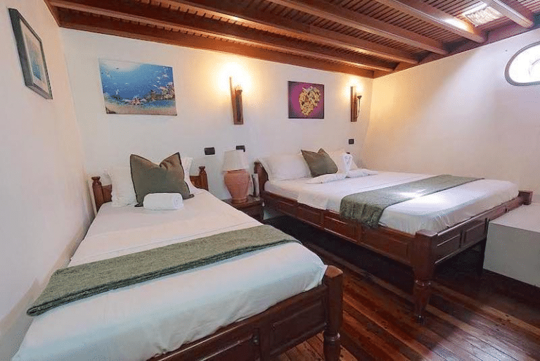 Moonima cabin with a double bed and a single bed